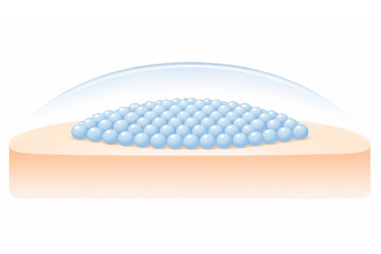 Illustration showing structured water molecules organized under a hydration dome on skin, representing ectoin barrier protection.
